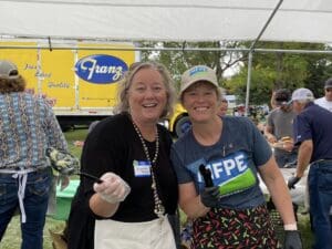Denise and Friend Serving food at MFPE event